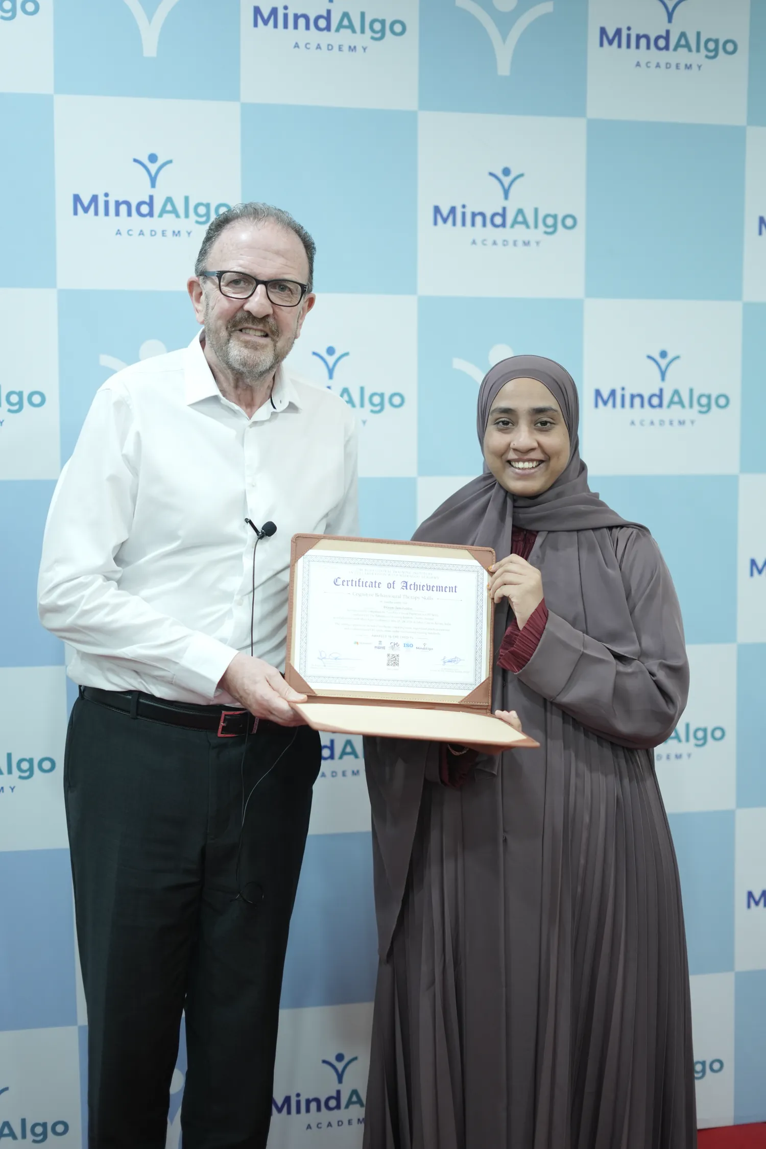 MindAlgo Academy graduate with their International Diploma in CBT certificate