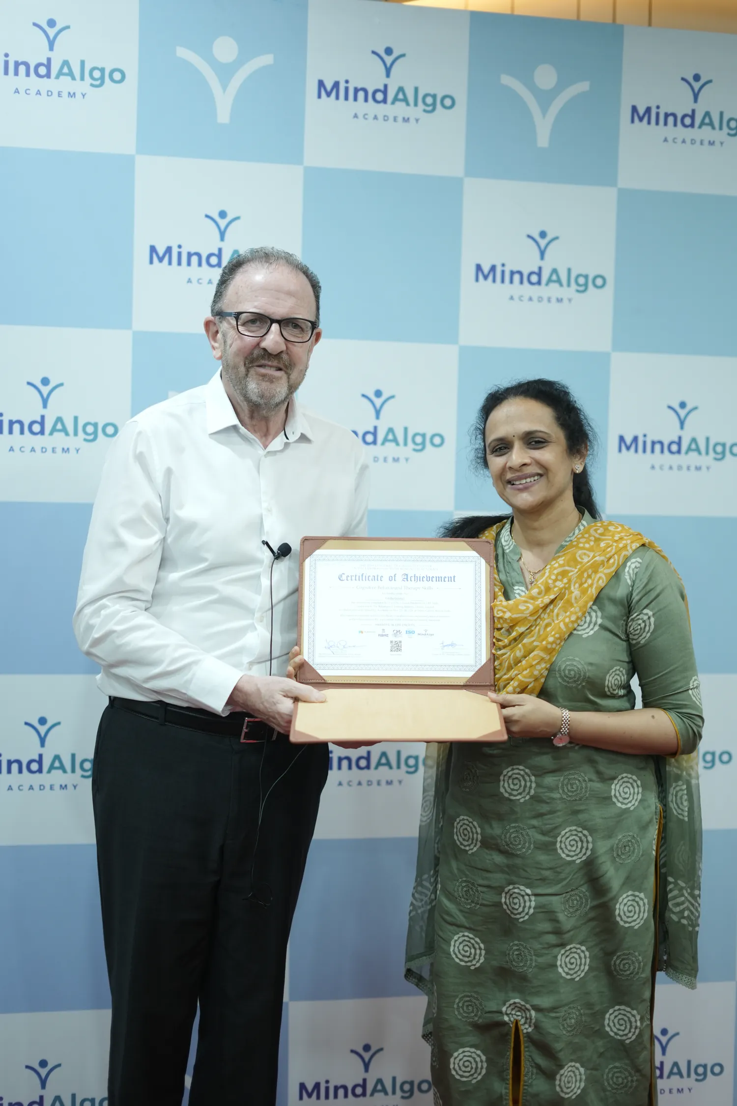 MindAlgo Academy graduate with their International Diploma in CBT certificate