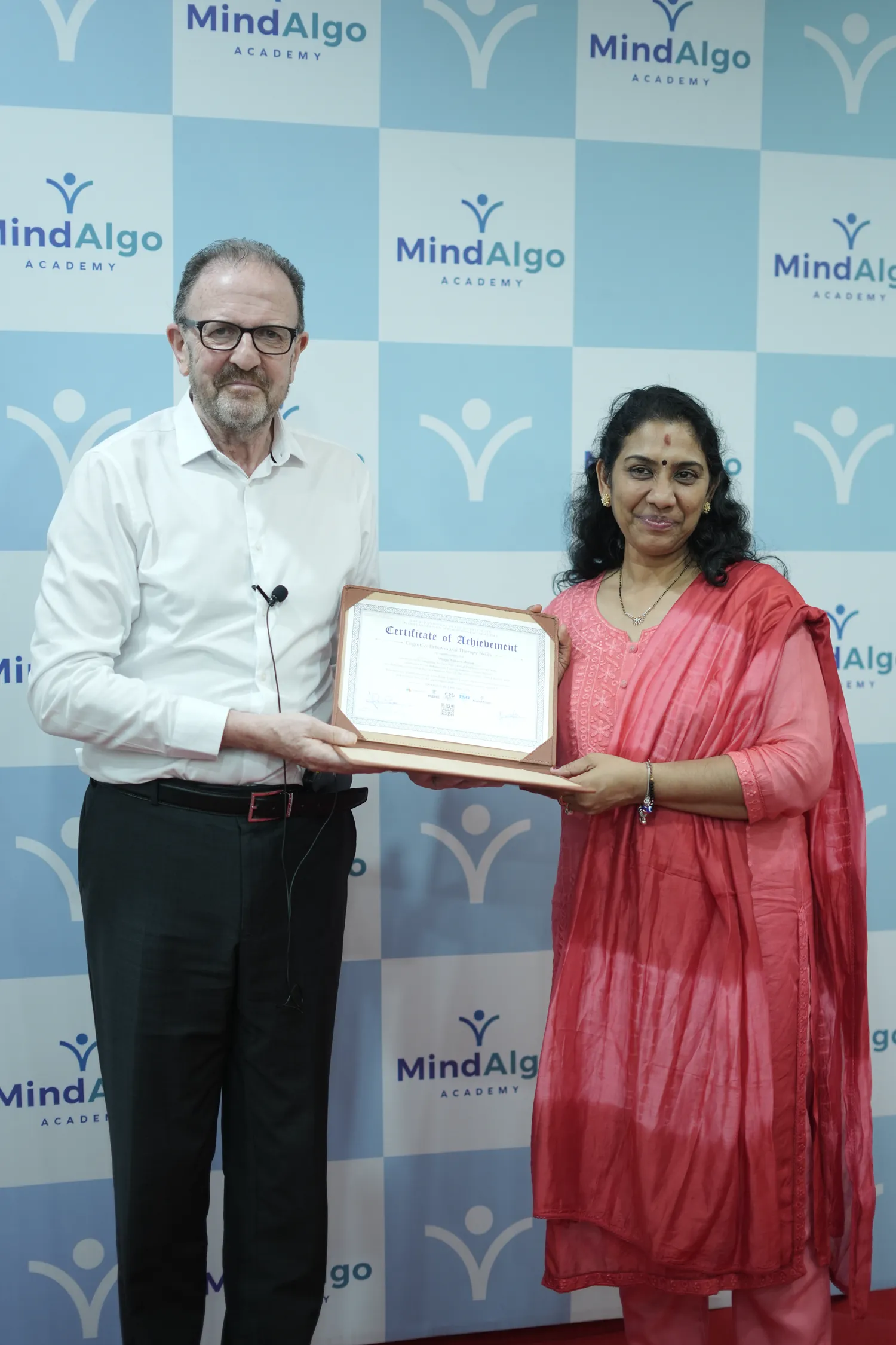 MindAlgo Academy graduate with their International Diploma in CBT certificate