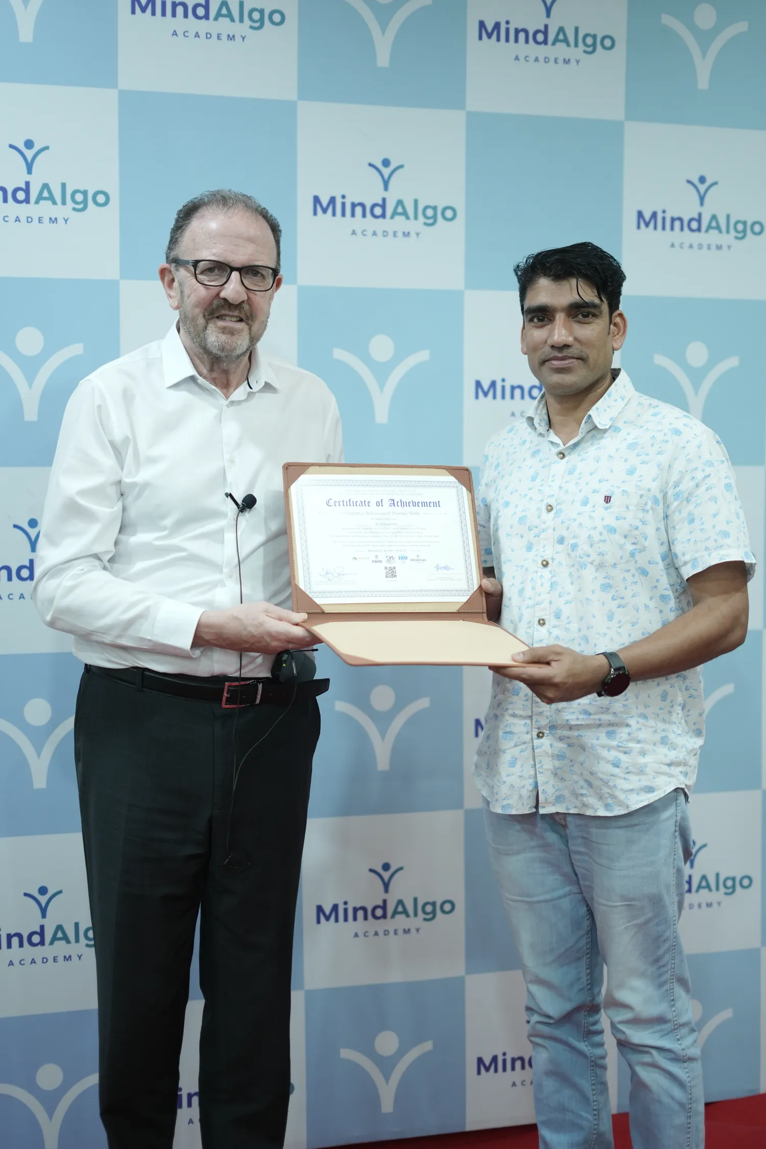 MindAlgo Academy graduate with their International Diploma in CBT certificate