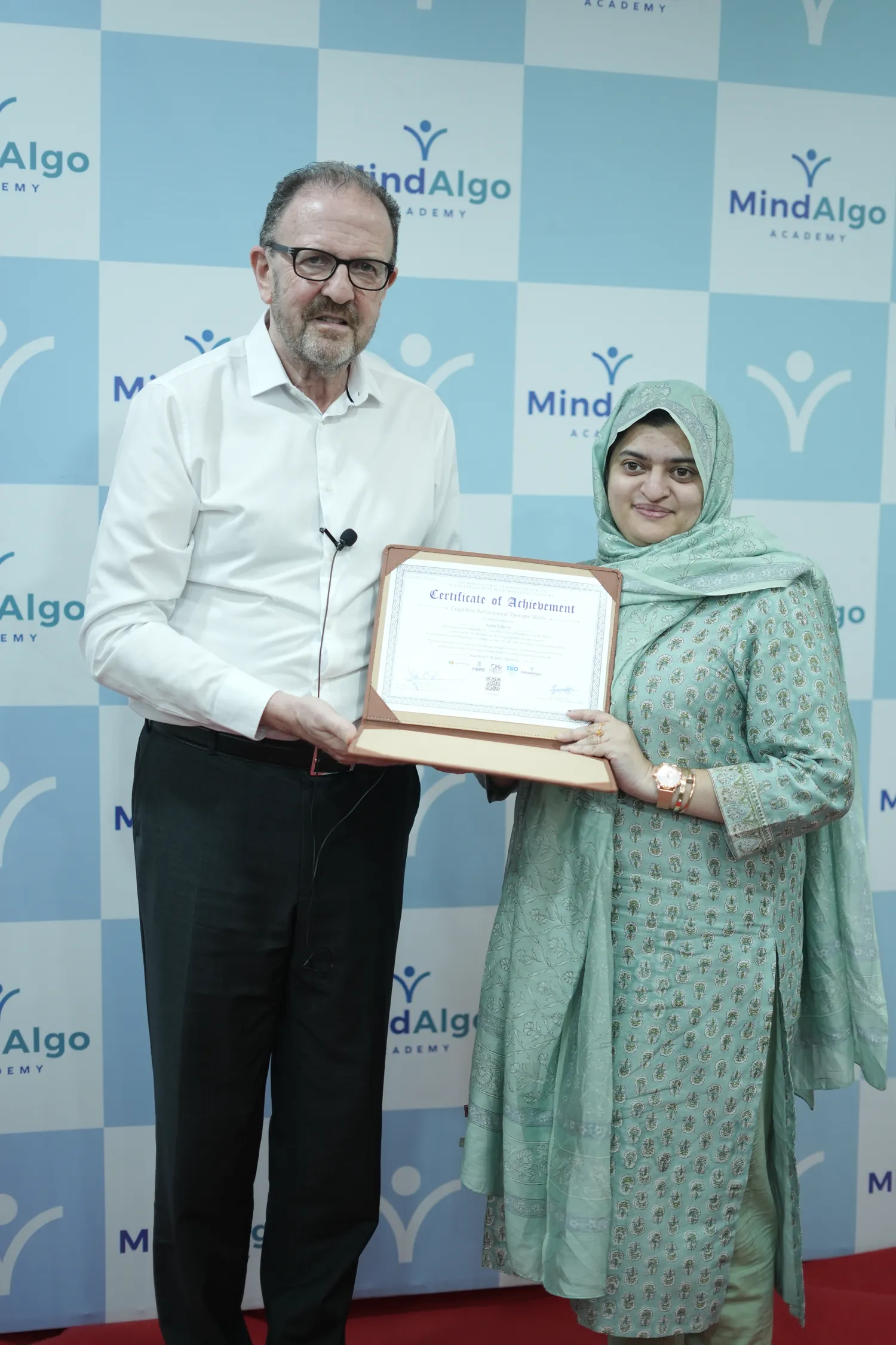 MindAlgo Academy graduate with their International Diploma in CBT certificate